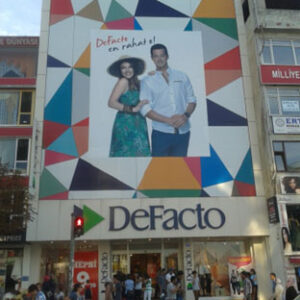 Defacto